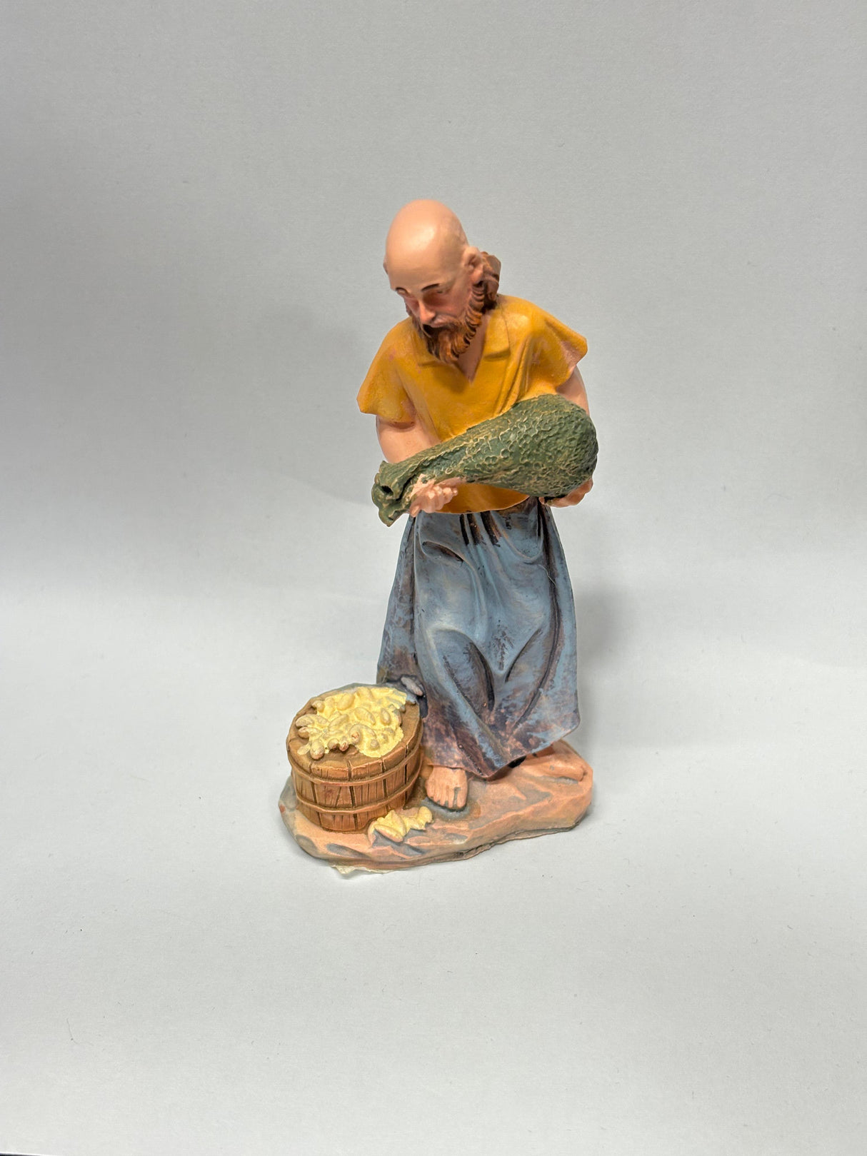 UOMO CON SACCO CM 10