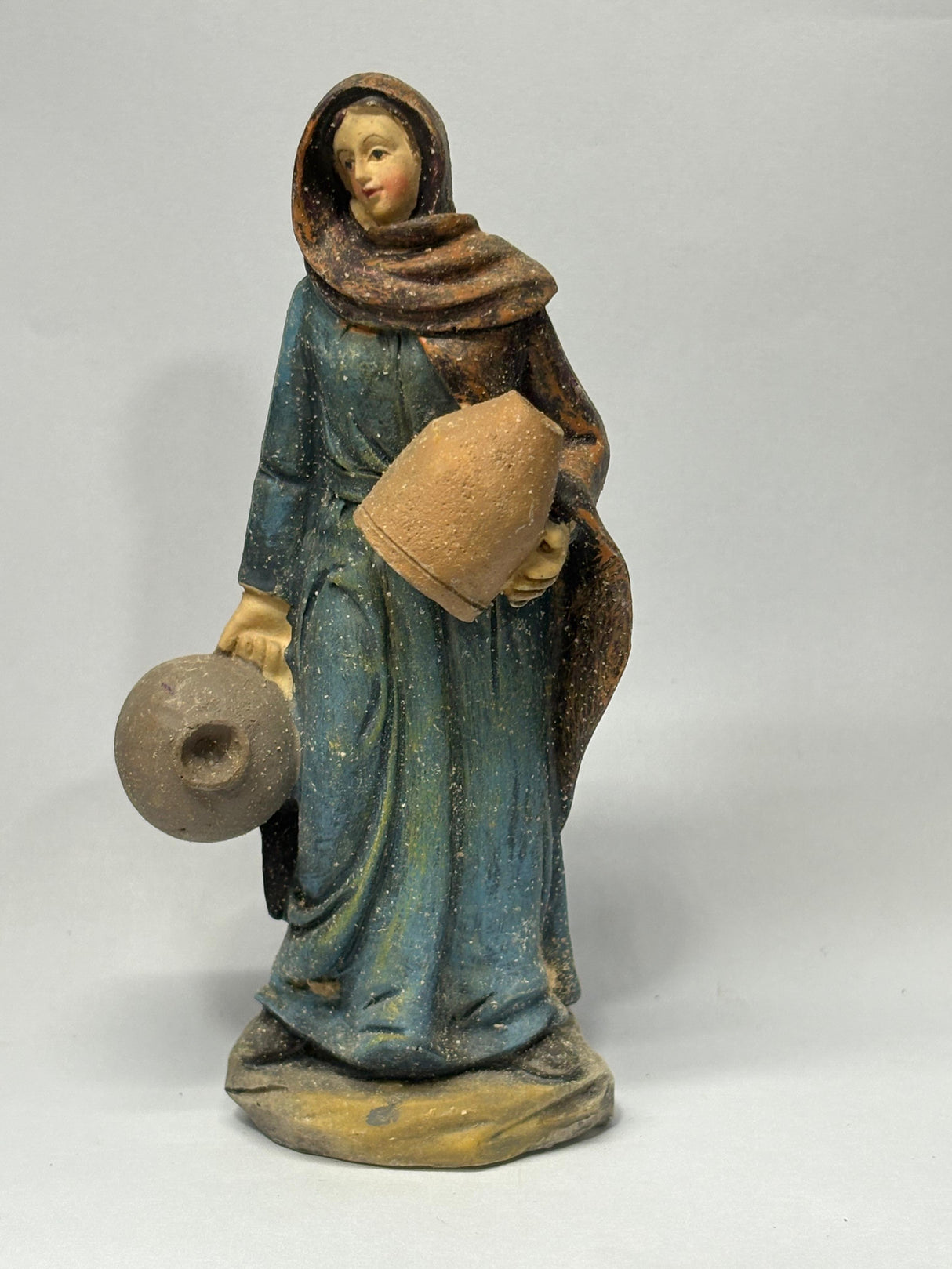 DONNA CON BROCCHE CM 12