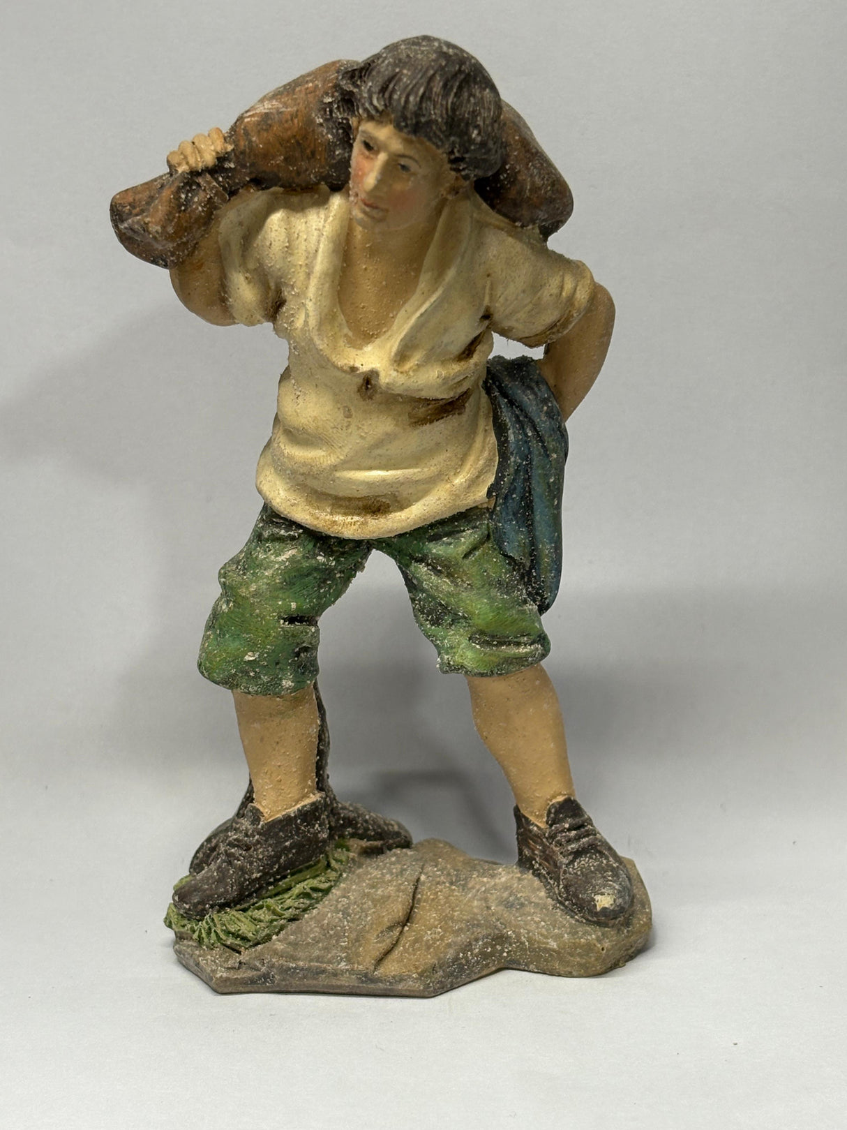 UOMO CON SACCO CM 12